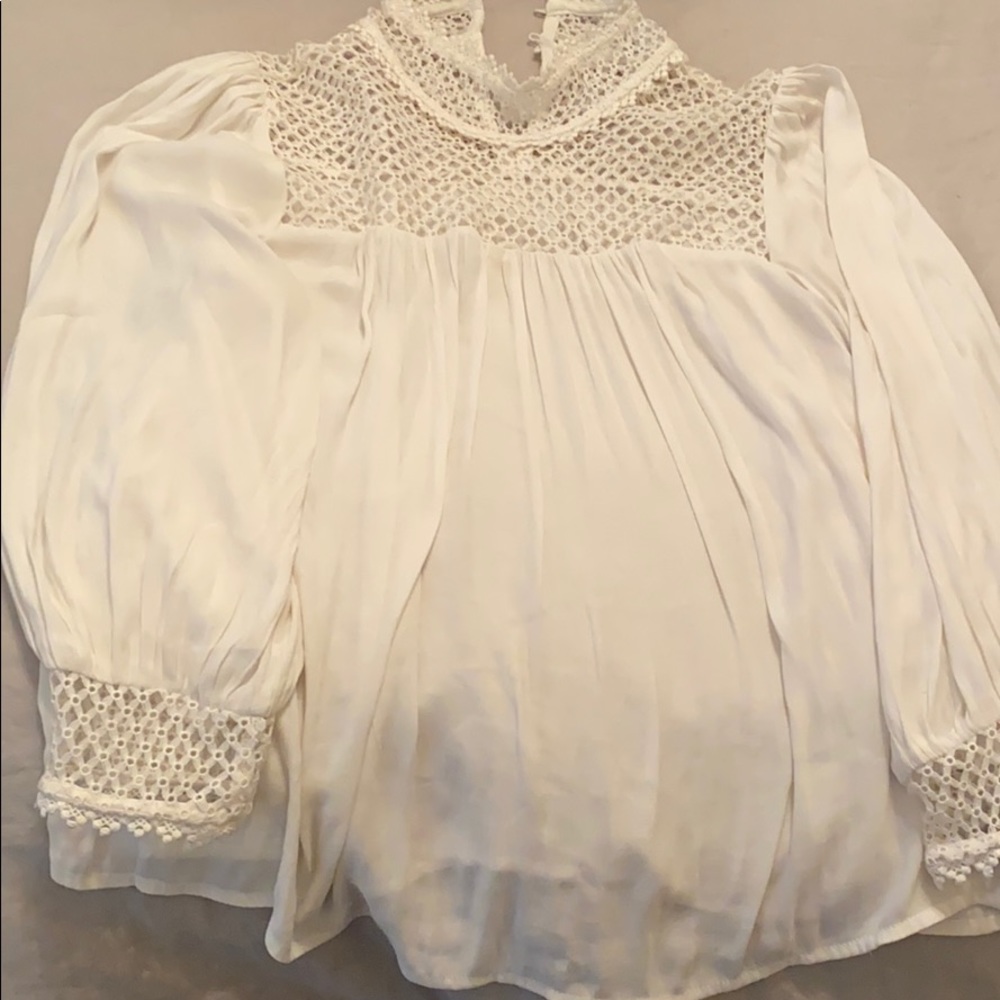 White blouse with lace neck and sleeves